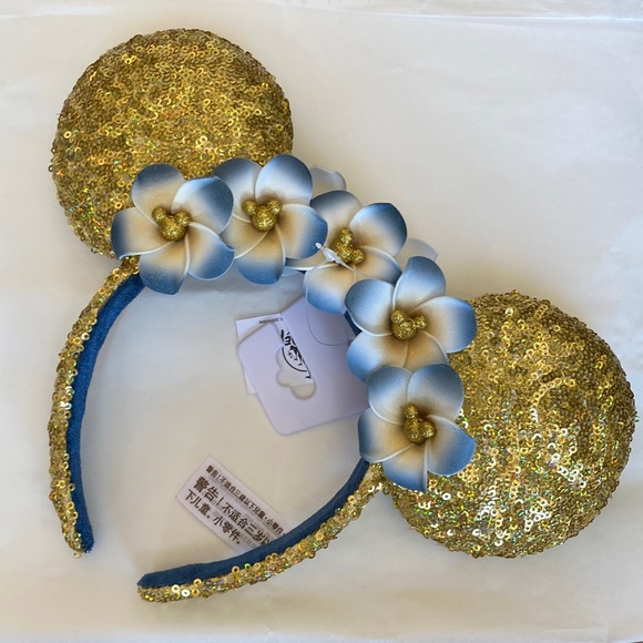 Disney Aulani Gold Sequinced Earidescent Plumeria Ear Headband